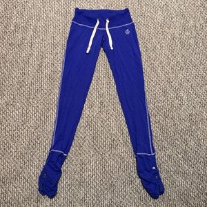 Green apple purple yoga pants